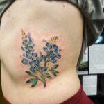 Mike Duncan flower tattoo